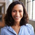 Young Mixed Race Businesswoman Smiling to Camera